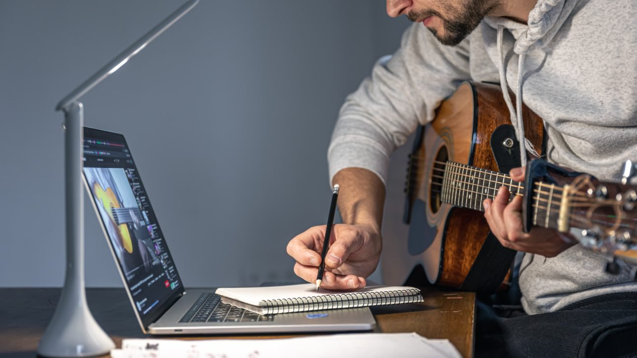 A man with a guitar.